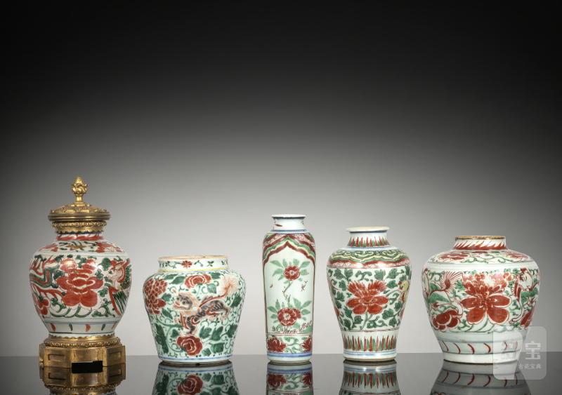 A group of five vases and shoulder pots with 'Wucai' decoration, including flowers, lions and phoenixes, one with a European ormolu mount